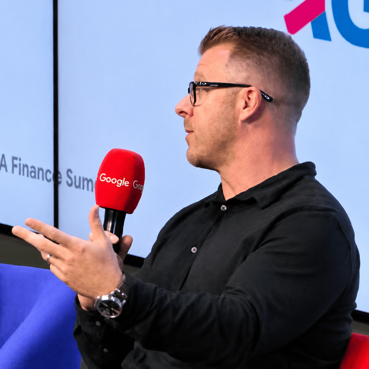 Paul Stevens speaking at a conference